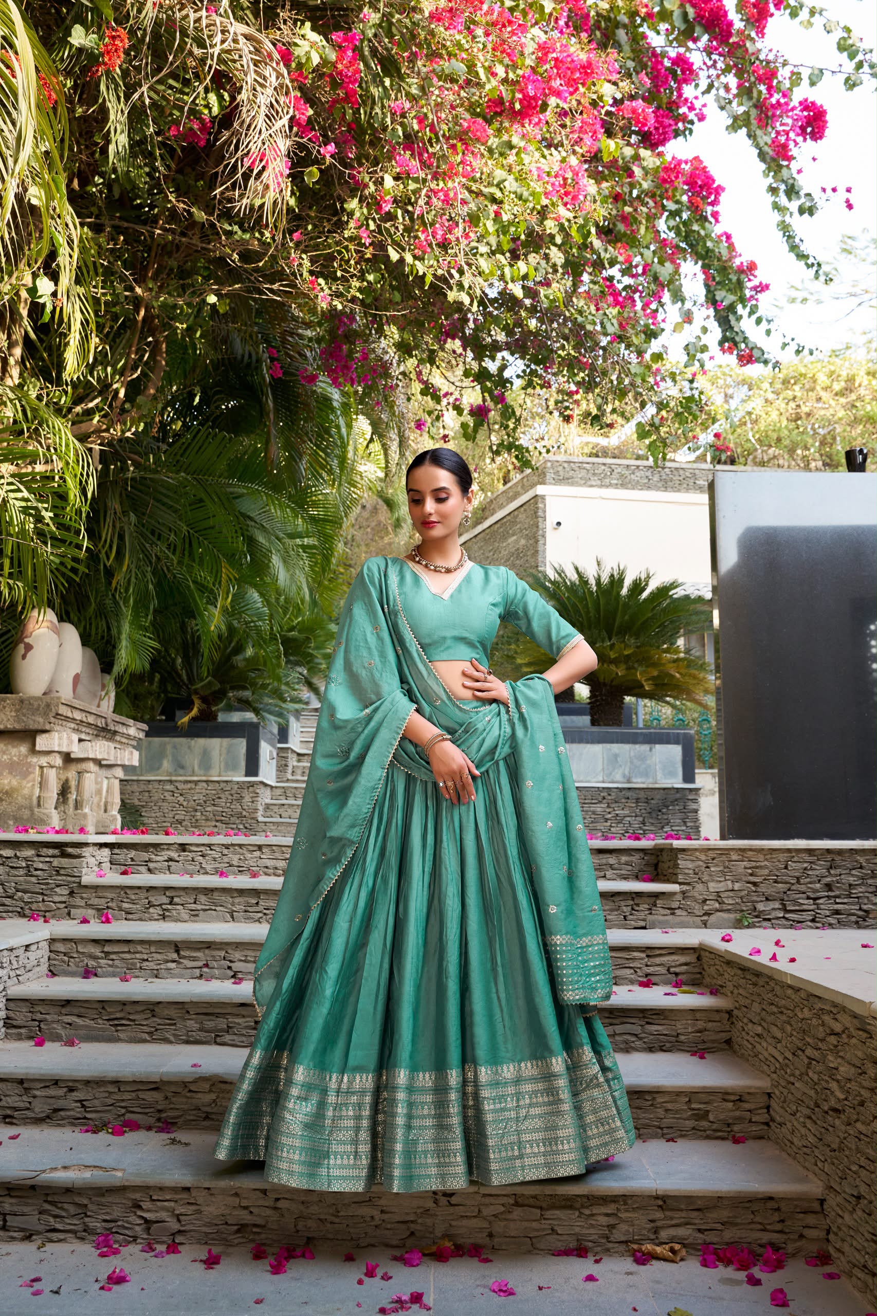 Crafted for Grace and Beauty: Pure Chanderi Plain Lehenga with Intricate Zari Work Border, Accompanied by Sequin Embellished Dupatta