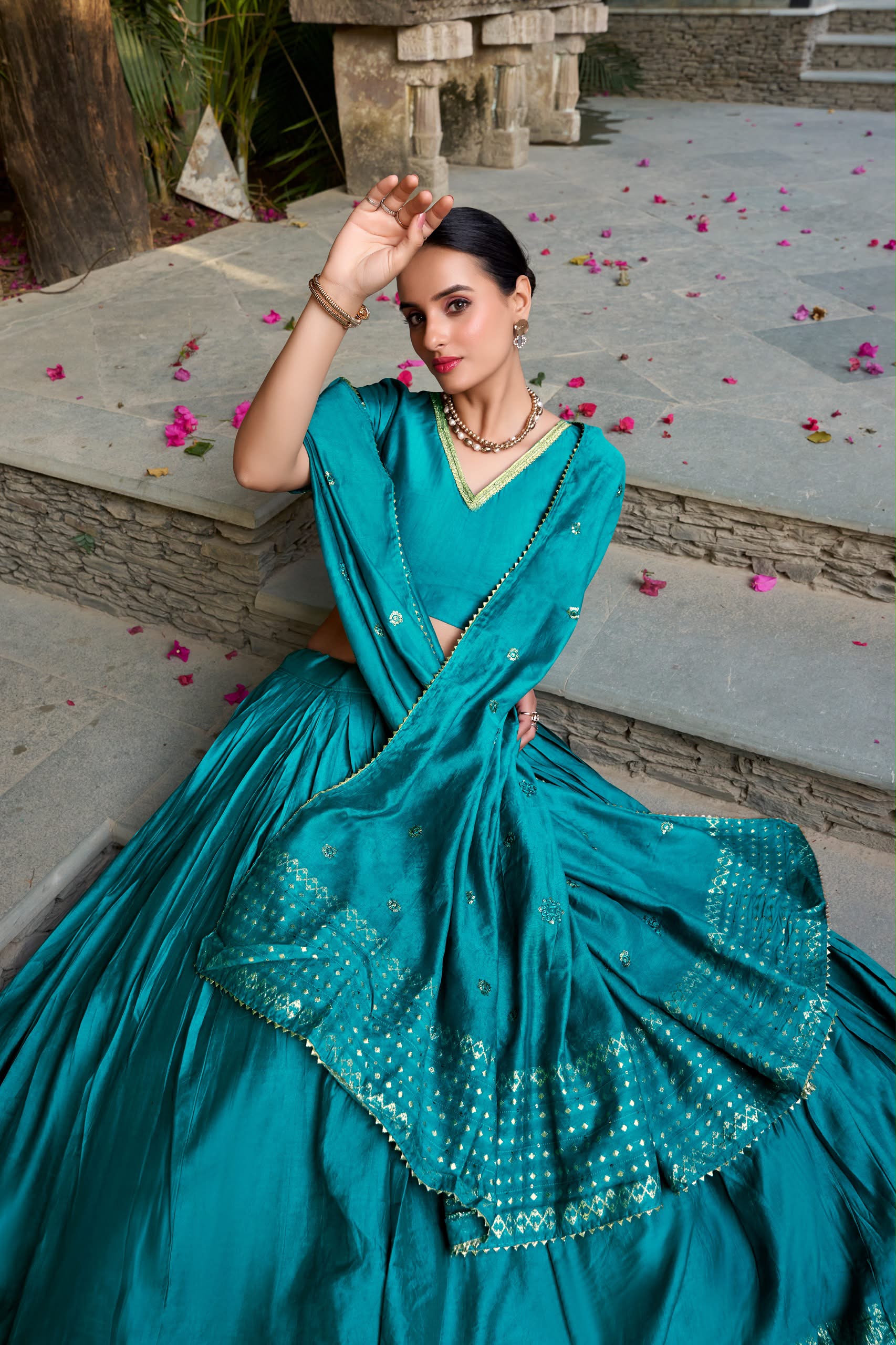 Crafted for Grace and Beauty: Pure Chanderi Plain Lehenga with Intricate Zari Work Border, Accompanied by Sequin Embellished Dupatta