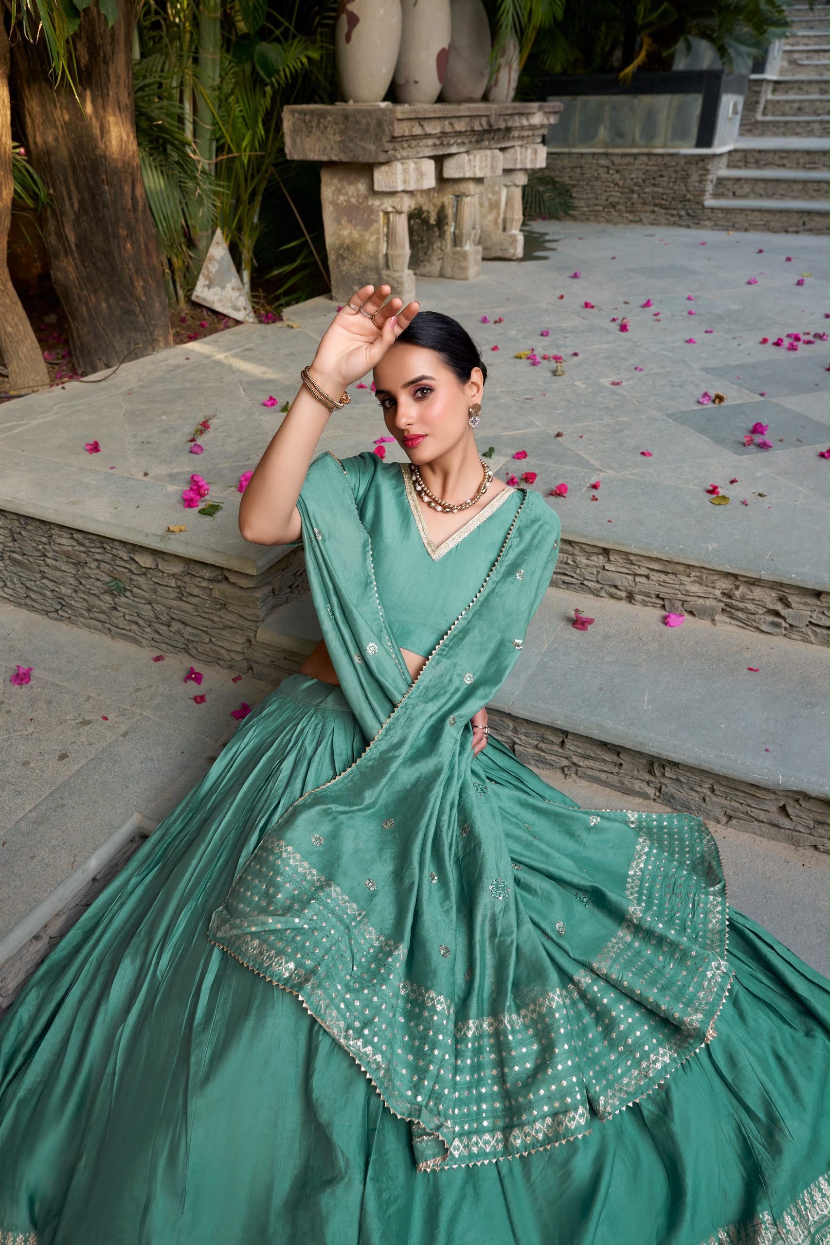 Crafted for Grace and Beauty: Pure Chanderi Plain Lehenga with Intricate Zari Work Border, Accompanied by Sequin Embellished Dupatta