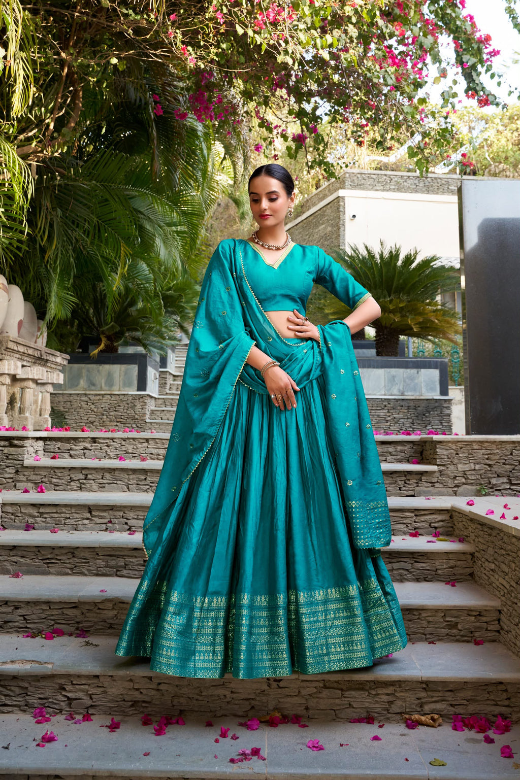 Crafted for Grace and Beauty: Pure Chanderi Plain Lehenga with Intricate Zari Work Border, Accompanied by Sequin Embellished Dupatta