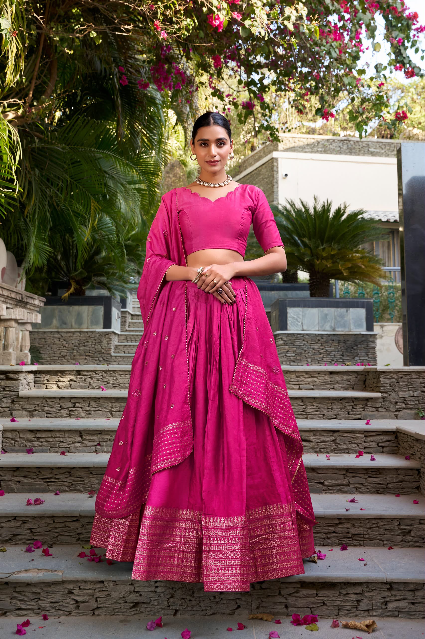 Crafted for Grace and Beauty: Pure Chanderi Plain Lehenga with Intricate Zari Work Border, Accompanied by Sequin Embellished Dupatta