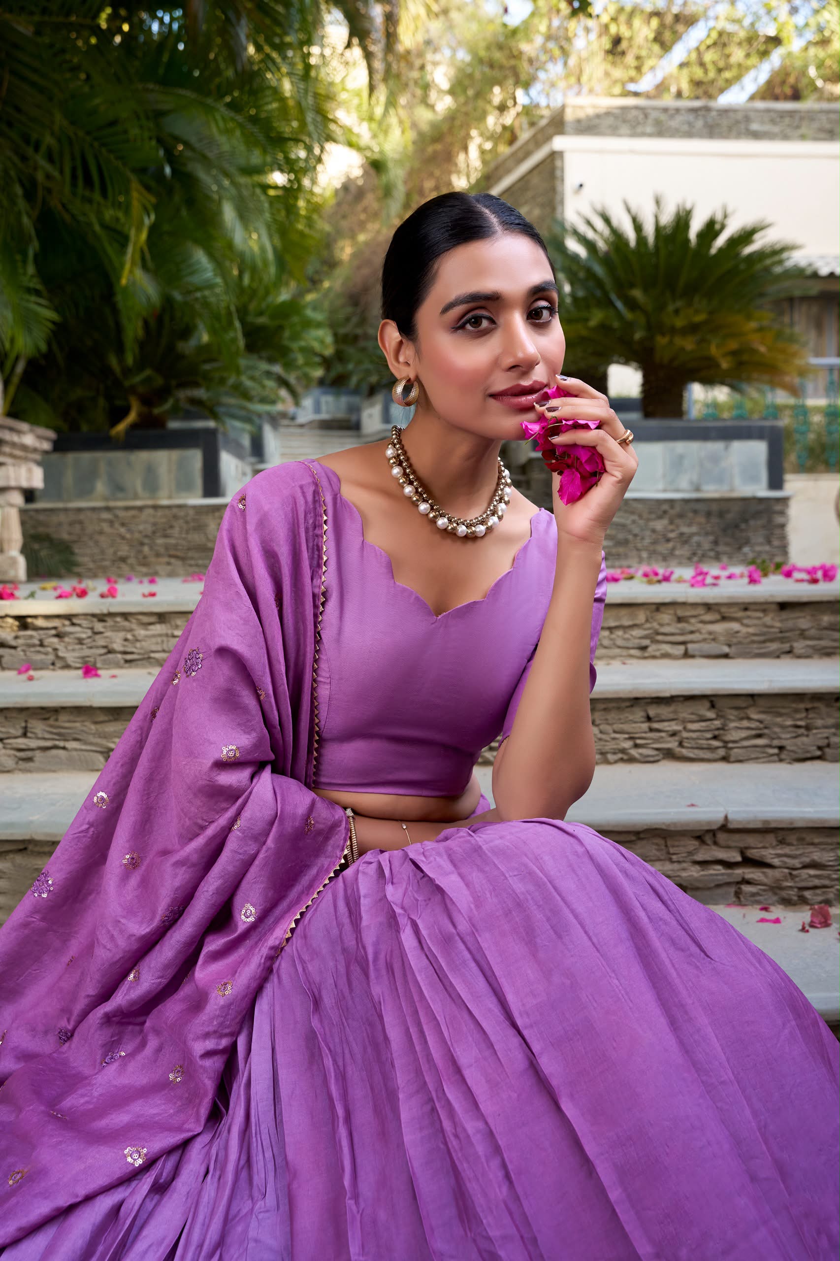 Crafted for Grace and Beauty: Pure Chanderi Plain Lehenga with Intricate Zari Work Border, Accompanied by Sequin Embellished Dupatta