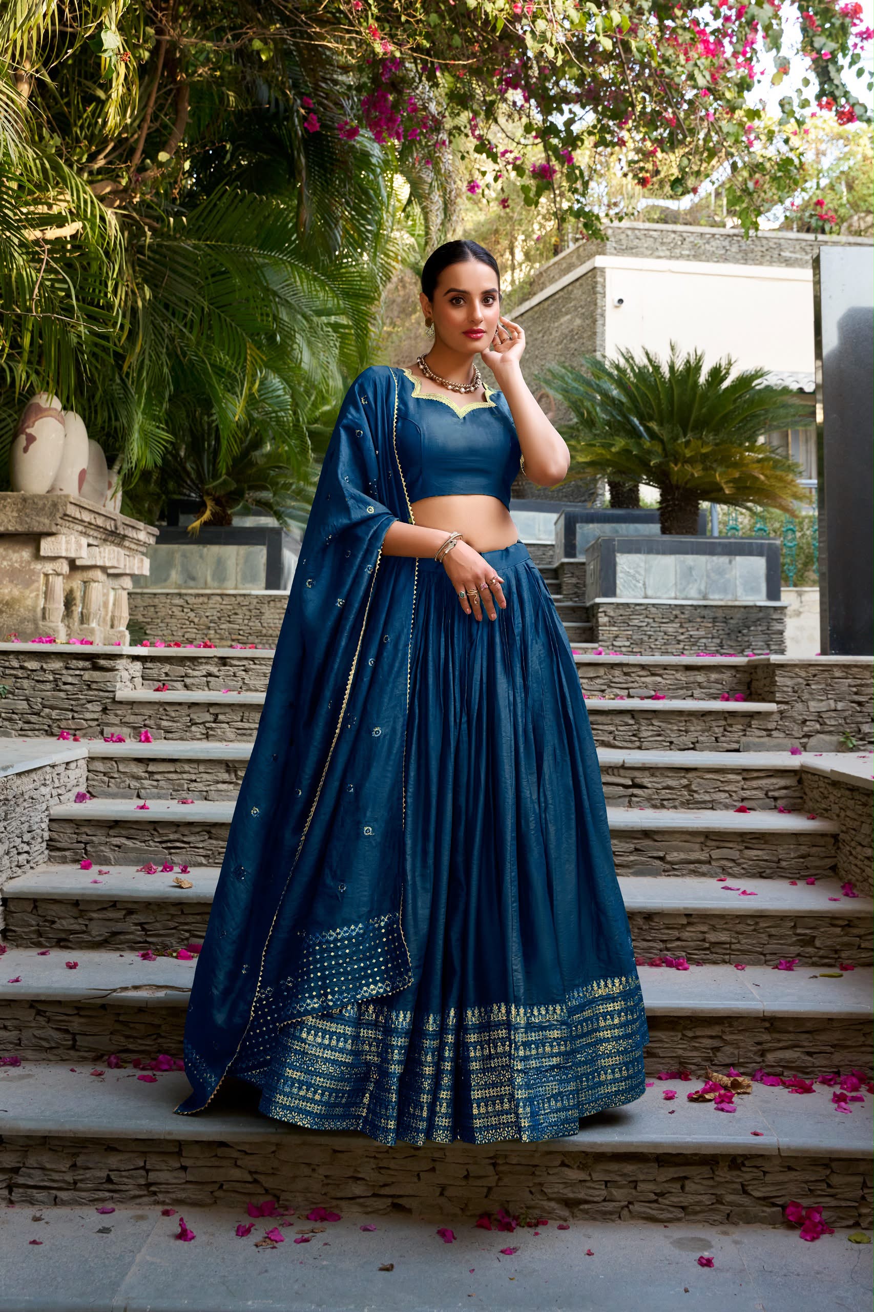 Crafted for Grace and Beauty: Pure Chanderi Plain Lehenga with Intricate Zari Work Border, Accompanied by Sequin Embellished Dupatta