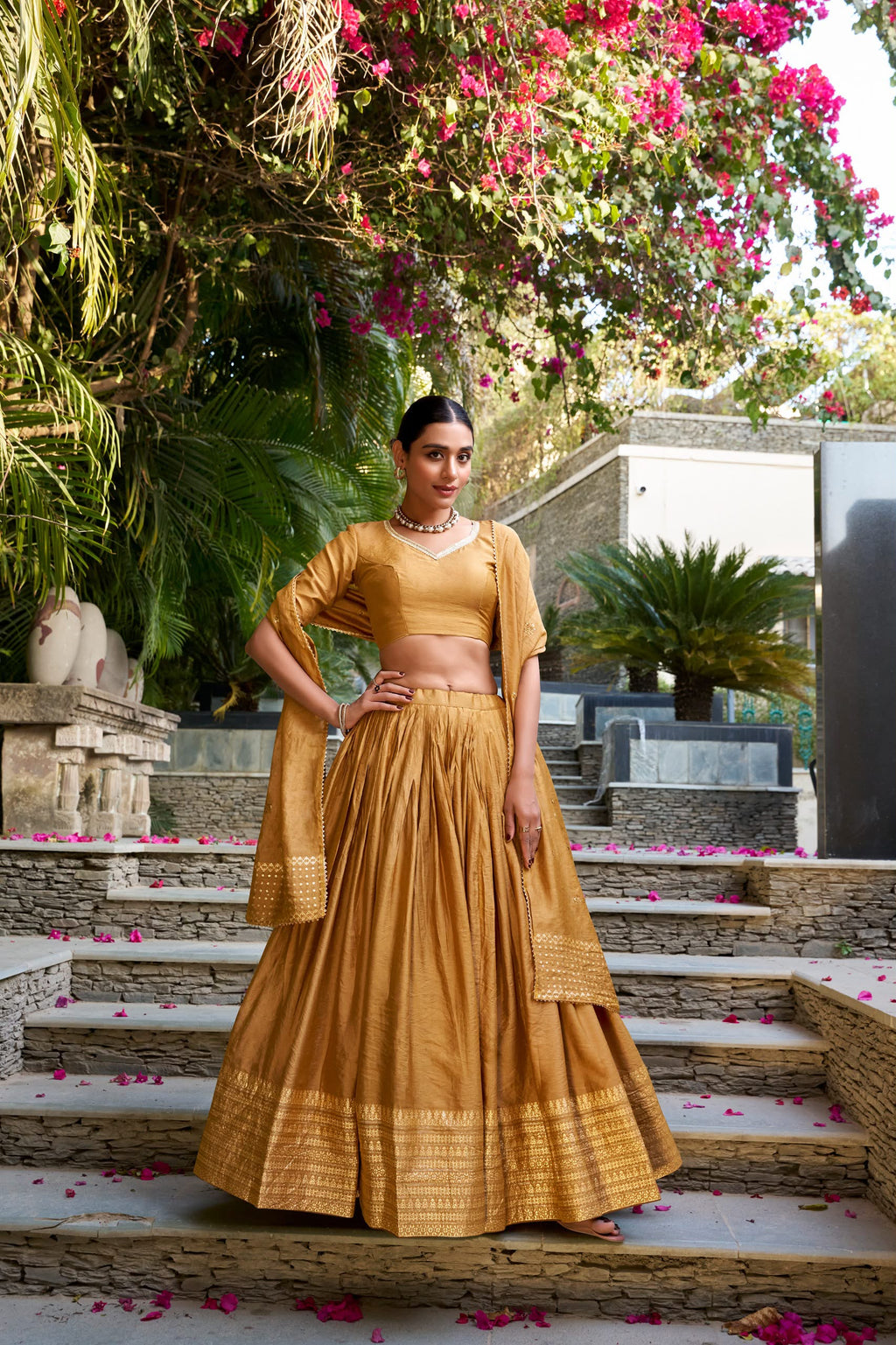 Crafted for Grace and Beauty: Pure Chanderi Plain Lehenga with Intricate Zari Work Border, Accompanied by Sequin Embellished Dupatta